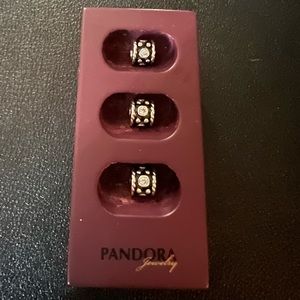 Pandora beads oxidized silver and cz’s.